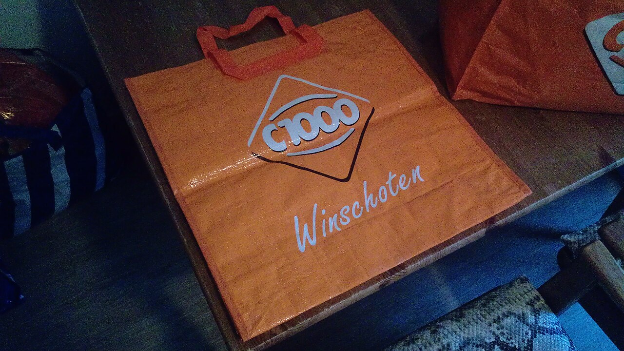 An orange supermarket shopping bag