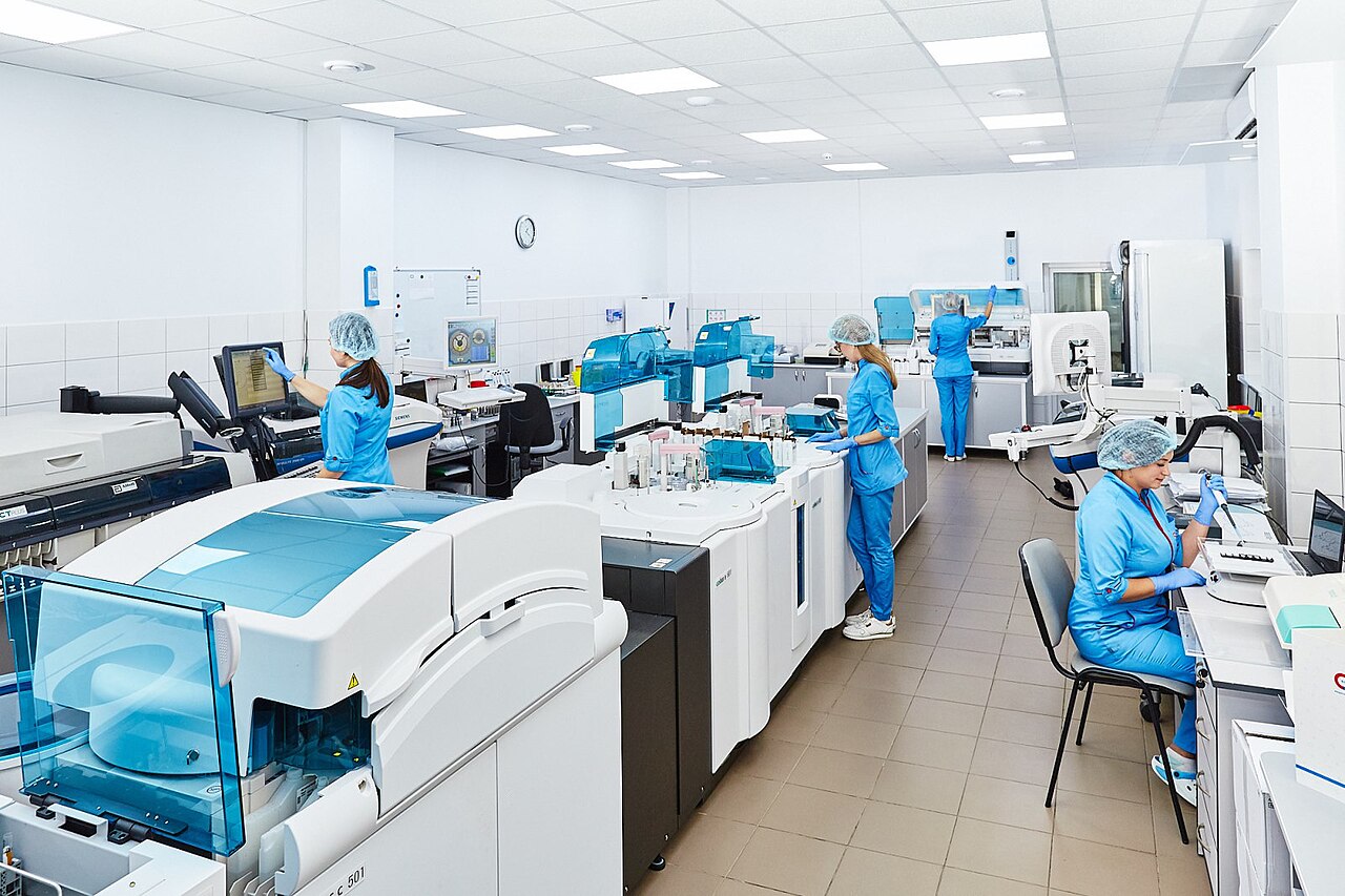 Scientists working in a testing laboratory
