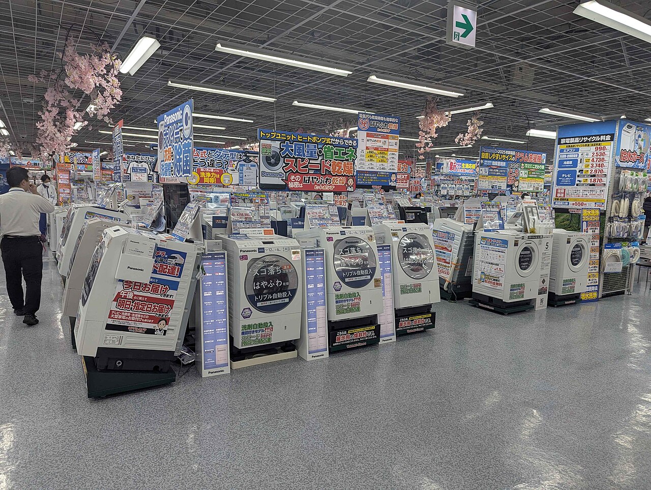 Rows of washing machines in a Japanese electronics store
